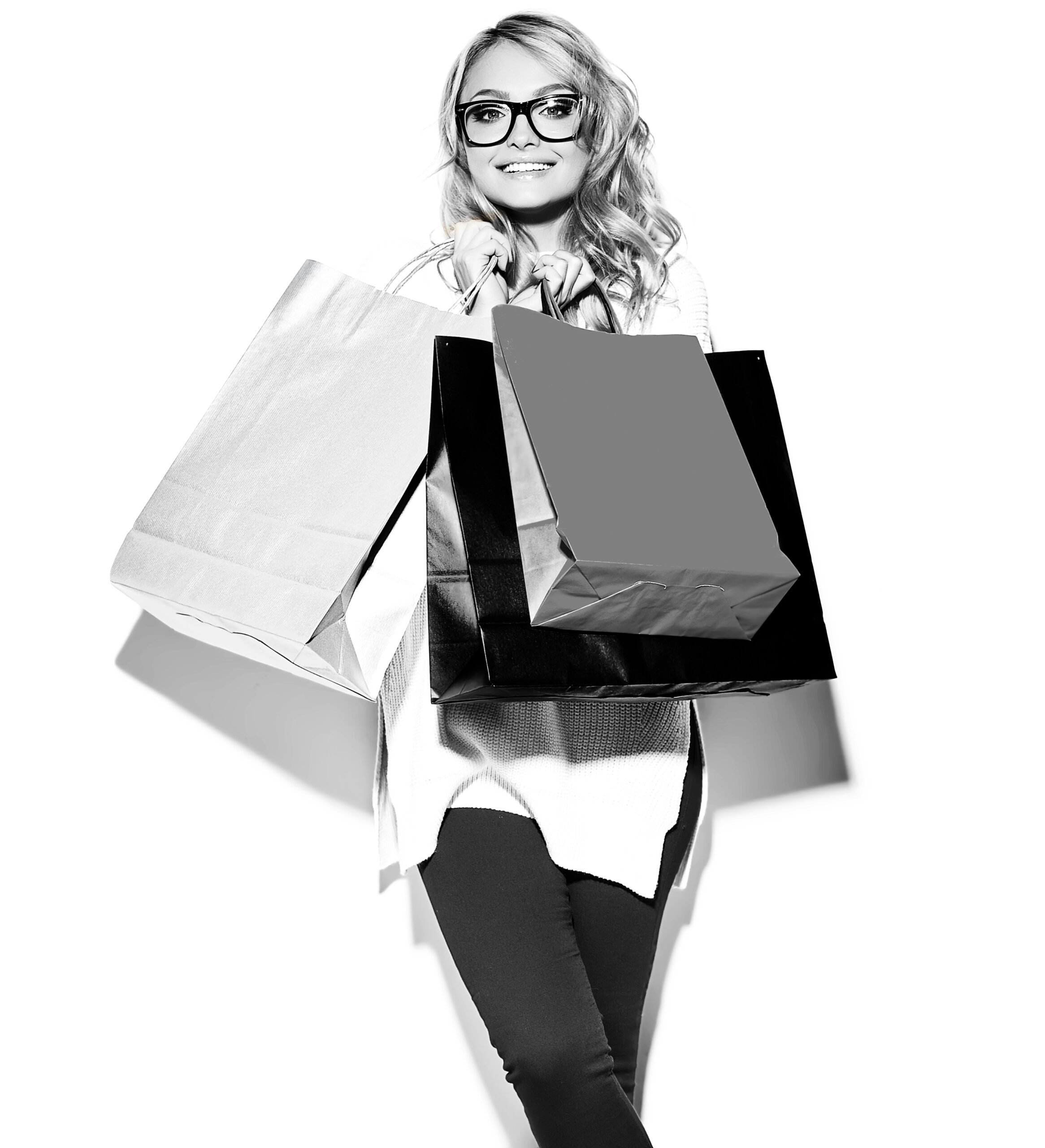 portrait of beautiful cute happy sweet smiling blonde woman girl holding in her hands big shopping colorful bags in hipster clothes isolated on white